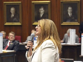 Arizona state Rep. Kelly Townsend addresses delegates to a balanced budget planning convention at the Arizona Capitol in Phoenix on Sept. 12, 2017, shortly after being nominated to serve as president of the convention. Lawmakers from 19 states are trying to develop a plan in Arizona this week for carrying out a growing, but unlikely, national effort to amend the Constitution to require a balanced U.S. budget. The plan is to add an amendment through a convention, a long-shot effort that has never been successfully done. (AP Photo/Bob Christie)