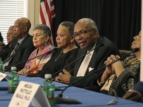 Surviving members of the Little Rock Nine, the students who integrated Central High School in 1957, speak with the media Friday, Sept.  22, 2017, at the Clinton School of Public Service in Little Rock, Ark. From the left are Thelma Mothershed Wair, Minnijean Brown Trickey, Terrence J. Roberts, Carlotta Walls LaNier, Gloria Ray Karlmark, Ernest G. Green and Elizabeth Eckford. Melba Pattillo Beals attended and is off the camera to the right. Jefferson Thomas died in 2010. (AP Photo/Kelly P. Kissel)
