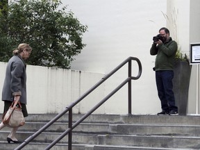 Former Alaska Dispatch News Publisher Alice Rogoff enters the federal bankruptcy court in Anchorage, Alaska, on Monday, Sept. 11, 2017, where a judge was scheduled to determine the fate of Alaska's largest newspaper. Rogoff purchased the newspaper in 2014 for $34 million from The McClatchy Co., and filed for bankruptcy on Aug. 12, 2017. (AP Photo/Mark Thiessen)