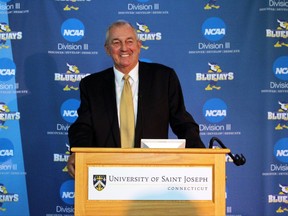 Hall of Fame basketball coach Jim Calhoun is introduced at the University of Saint Joseph in West Hartford, Conn. on Sept. 28, 2017. Calhoun is coming out of retirement to build a men's basketball program at the Division III school, which will admit men for the first time next fall. (AP Photo/Pat Eaton-Robb)