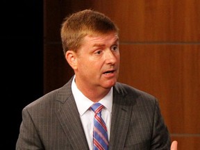 City Councilman Kenny Smith speaks to the moderator during a Mayoral debate in Charlotte, N.C. on Wednesday, Sept. 6, 2017. Smith is a Republican candidate running for mayor. The city's primary is scheduled for Tuesday, Sept. 12. (AP Photo/Skip Foreman)