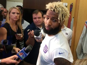 New York Giants wide receiver Odell Beckham speaks with reporters in the locker room at the NFL football team's training facility Wednesday, Sept. 27, 2017, in East Rutherford, N.J. (AP Photo/Tom Canavan