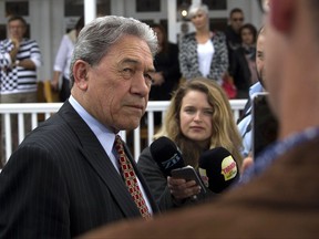 New Zealand First leader Winston Peters is interviewed by the media in Russell, New Zealand, Sunday, Sept. 24, 2017. Prime Minister Bill English's National Party won the most votes in New Zealand's general election on Saturday but not enough to form a government without help from other political parties.(Nick Reed/New Zealand Herald via AP)