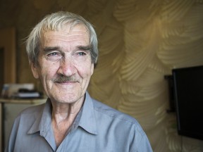 In this Thursday, Aug. 27, 2015 photo former Soviet missile defense forces officer Stanislav Petrov poses for a photo at his home in Fryazino, Moscow region, Russia, Thursday, Aug. 27, 2015