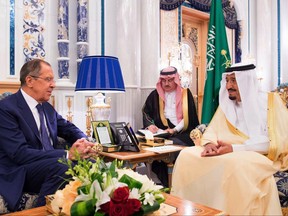 In this photo released by Saudi Press Agency, SPA, Saudi King Salman, right, receives the Russian Foreign Minister Sergey Lavrov at Al-Salam Palace in Jiddah, Saudi Arabia, Sunday Sept. 10, 2017. (Saudi Press Agency via AP)