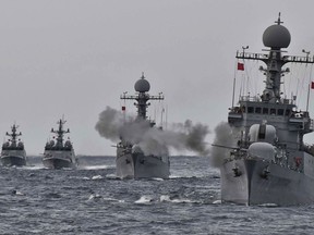 In this photo provided by South Korea Defense Ministry, a South Korean navy ship fires during a drill in South Korea's East Sea, Tuesday, Sept. 5, 2017. South Korean warships conducted live-fire exercises at sea Tuesday as Seoul continued its displays of military capability following U.S. warnings of a "massive military response" after North Korea detonated its largest-ever nuclear test explosion. (South Korea Defense Ministry via AP)