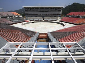 This June 29, 2017, photo shows a general view of the Pyeongchang Olympic Stadium under construction in Pyeongchang, South Korea. Construction has been nearly completed on the controversial stadium that will host the opening and closing ceremonies for the Pyeongchang 2018 Winter Games in South Korea. (Kim Kyung-mock/Newsis via AP)