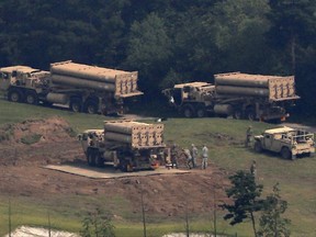 U.S. missile defense system called Terminal High-Altitude Area Defense system, or THAAD, are seen at a golf course in Seongju, South Korea, Thursday, Sept. 7, 2017. Seoul's Defense Ministry on Thursday said the U.S. military has completed adding more launchers to a contentious U.S. missile-defense system in South Korea to better cope with North Korean threats. The deployment of the Terminal High-Altitude Area Defense system has angered North Korea but also China and Russia, which see the system's powerful radar as a threat to their own security. (Kim Jun-beom/Yonhap via AP)