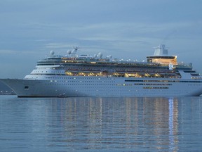 The Royal Caribbean's Majesty of the Seas cruise ship arrives with families evacuated from Caribbean islands devastated by Hurricane Irma, in San Juan, Puerto Rico, Thursday, Sept. 14, 2017. The U.S. territory of Puerto Rico has received nearly 2,000 U.S. citizens who were living or vacationing on in the U.S. and British Virgin Islands, including more than 500 who arrived via the cruise ship on Thursday, the first such arrival of its kind. (AP Photo/Ricardo Arduengo)