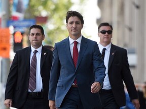 Prime Minister Justin Trudeau makes his way to a press conference at the National Press Theatre in Ottawa on Tuesday, Sept. 19, 2017. THE CANADIAN PRESS/Sean Kilpatrick