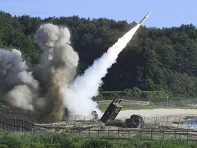 In this photo provided by South Korea Defense Ministry, a U.S. MGM-140 Army Tactical Missile is fired during the combined military exercise between the U.S. and South Korea against North Korea at an undisclosed location in South Korea, Wednesday, July 5, 2017.