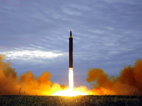 In this Aug. 29, 2017 file photo distributed on Aug. 30, 2017, by the North Korean government shows what was said to be the test launch of a Hwasong-12 intermediate range missile in Pyongyang, North Korea.