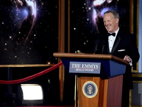 Spicer speaks onstage during the 69th Annual Primetime Emmy Awards.
