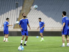 Syria's national soccer team trains for a World Cup qualifying match against Iran on Sept. 4.