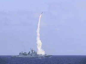 A frame grab provided on Tuesday, Sept. 5, 2017,   shows a long-range Kalibr cruise missile launched by the Russian Navy Admiral Essen frigate in the Mediterranean Sea.