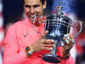 Rafael Nadal holds the U.S. Open trophy on Sept. 10.