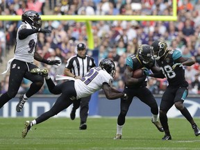 Jacksonville Jaguars wide receiver Marqise Lee (11) runs against the Baltimore Ravens defense during the first half of an NFL football game at Wembley Stadium in London, Sunday Sept. 24, 2017. (AP Photo/Matt Dunham)