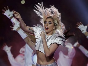 FILE - In this Feb. 5, 2017, file photo, Lady Gaga performs during the halftime show of the NFL Super Bowl 51 football game between the New England Patriots and the Atlanta Falcons in Houston. Lady Gaga has postponed her world tour's European leg until next year because of ongoing health problems.  The six-week part of the Joanne World Tour was set to kick off in Barcelona on Sept. 21. (AP Photo/Matt Slocum, File)