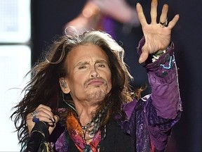 FILE - In this May 26, 2017 file photo, singer Steven Tyler performs during a concert of Aerosmith at the Koenigsplatz in Munich, Germany. Aerosmith singer Tyler says he has returned to the United States for medical care and the band is canceling the last four shows of its tour in South America. Tyler said on social media Tuesday, Sept. 26, 2017, that he flew back to the U.S. on Monday night after a show in Sao Paulo, Brazil. AP Photo/Lukas Barth, File)