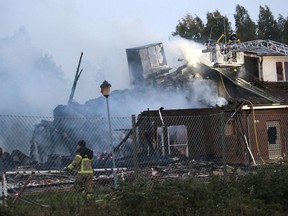 Smoke rises from a burning mosque during a fire in Orebro, west of Stockholm, Sweden, Tuesday, Sept. 26, 2017. Swedish police said the fire that partly destroyed the mosque is being investigated as arson. (Kicki Nilsson/TT NEWS AGENCY)