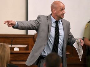Assistant District Attorney Paul Hagerman points to Zachary Adams as he gives his closing arguments on behalf of the state during the Holly Bobo murder trial, Thursday, Sept. 21, in Savannah, Tenn. Adams is charged with felony first-degree murder, especially aggravated kidnapping, aggravated rape in the death of Holly Bobo.  (Kenneth Cummings/The Jackson Sun via AP, Pool)