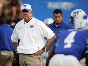 Middle Tennessee head coach Rick Stockstill watches as players warm up before an NCAA college football game against Vanderbilt Saturday, Sept. 2, 2017, in Murfreesboro, Tenn. (AP Photo/Mark Humphrey)