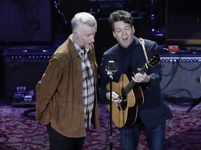 Billy Bragg, left, and Joe Henry perform during the Americana Honors and Awards show Wednesday, Sept. 13, 2017, in Nashville, Tenn. (AP Photo/Mark Zaleski)