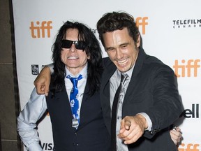 Tommy Wiseau, left, and James Franco attend a premiere for "The Disaster Artist" on day 5 of the Toronto International Film Festival at the Ryerson Theatre on Monday, Sept. 11, 2017, in Toronto. (Photo by Arthur Mola/Invision/AP)