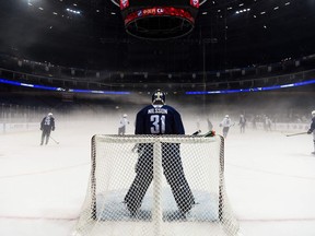 Vancouver Canucks goaltender Andres Nilsson stands guard during practice in Shanghai on Sept. 19.