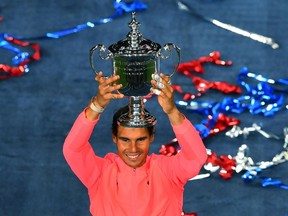 Rafael Nadal hoists the U.S. Open trophy on Sept. 10.