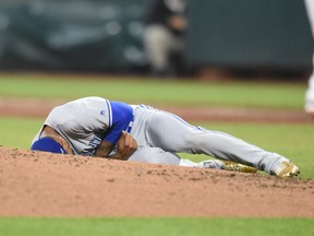 Toronto Blue Jays pitcher Marcus Stroman lies on the mound after he was hit by a Mark Trumbo line drive against the Baltimore Orioles on Sept. 2.