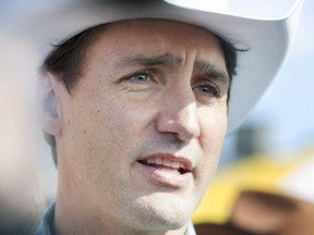 Prime Minister Justin Trudeau speaks to reporters during a visit to the annual Saint-Tite western festival in Saint-Tite, Que., Friday, September 8, 2017.