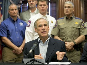 Gov. Greg Abbott talks about the effort to recover from Hurricane Harvey at a news conference at the Capitol in Austin, Texas, on Thursday, Sept. 7, 2017. (Jay Janner/Austin American-Statesman via AP)