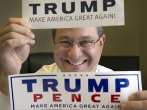 In this Jan. 11, 2017 photo, Trey Trainor, an Austin attorney specializing in election law who played a critical role for the Trump campaign at the Republican convention, poses with Trump campaign stickers at the Akerman Law Firm in Austin, Texas. The White House announced on Tuesday, Sept. 13, 2017, that President Donald Trump has appointed Trainor to the Federal Election Commission. (Ralph Barrera/Austin American-Statesman via AP)