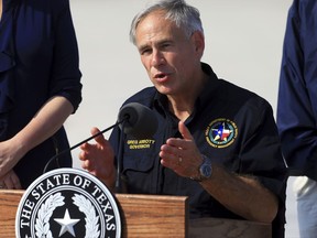 Texas Gov.r Greg Abbott talks to the media after visiting the Coastal Bend after Hurricane Harvey destroyed several homes, Thursday, Aug. 31, 2017, in Corpus Christi, Texas. (Gabe Hernandez/Corpus Christi Caller-Times via AP)