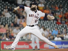 Houston Astros starting pitcher Dallas Keuchel throws to the Chicago White Sox during the first inning of a baseball game Thursday, Sept. 21, 2017, in Houston. (AP Photo/David J. Phillip)