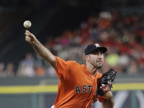Houston Astros starting pitcher Justin Verlander throws against the Los Angeles Angels during the first inning of a baseball game Friday, Sept. 22, 2017, in Houston. (AP Photo/David J. Phillip)