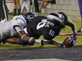 TCU wide receiver Desmon White (10) scores on a 13 yard pass in the second quarter against Jackson State during an NCAA college football game in Fort Worth, Texas, Saturday, Sept. 2, 2017. (Rodger Mallison/Star-Telegram via AP)