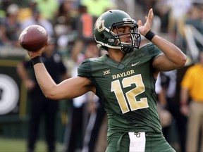 Baylor quarterback Anu Solomon (12) throws downfield against Liberty in the first half of an NCAA college football game, Saturday, Sept. 2, 2017, in Waco, Texas. (Rod Aydelotte/Waco Tribune Herald, via AP)