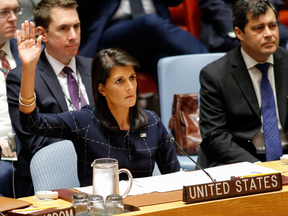 U.S. Ambassador to the United Nations Nikki Haley votes in favour of new sanctions against North Korea at a UN Security Council meeting on Sept. 11, 2017.