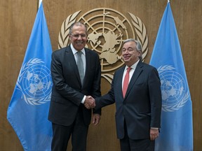 Russia Foreign Minister Sergey Lavrov, left, is greeted by United Nations Secretary-General Antonio Guterres before a meeting Thursday, Sept. 21, 2017, at U.N. headquarters. (AP Photo/Craig Ruttle)
