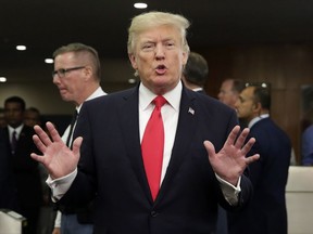 President Donald Trump stops to talk to the media as he leaves the United Nations headquarters, Monday, Sept. 18, 2017.