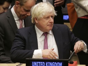 British Foreign Secretary Boris Johnson attends a meeting during the United Nations General Assembly at U.N. headquarters, Monday, Sept. 18, 2017. (AP Photo/Seth Wenig)