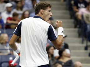 Pablo Carreno Busta, of Spain, reacts during his match with Denis Shapovalov, of Canada, during the fourth round of the U.S. Open tennis tournament, Sunday, Sept. 3, 2017, in New York. (AP Photo/Julie Jacobson)