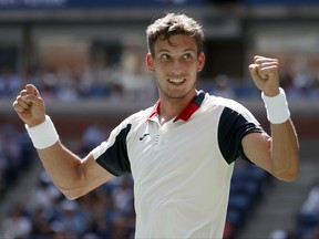 Pablo Carreno Busta, of Spain, reacts after beating Diego Schwartzman, of Argentina, during the quarterfinals of the U.S. Open tennis tournament, Tuesday, Sept. 5, 2017, in New York. (AP Photo/Jason Decrow)