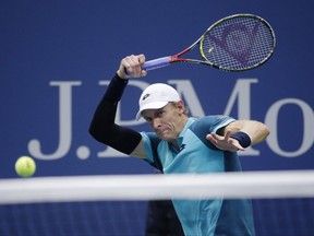 Kevin Anderson, of South Africa, returns a shot from Pablo Carreno Busta, of Spain, during the semifinals of the U.S. Open tennis tournament, Friday, Sept. 8, 2017, in New York. (AP Photo/Seth Wenig)
