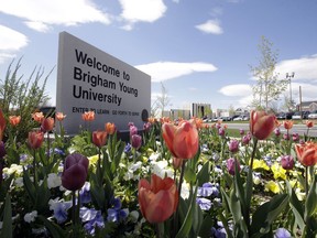 FILE - This April 19, 2016, file photo, shows a welcome sign to Brigham Young University in Provo, Utah. Mormon-church owned Brigham Young University in Utah announced Thursday, Sept. 21, 2017 that it is reversing its six-decade ban on selling caffeinated soft drinks on its campus. (AP Photo/Rick Bowmer, File)