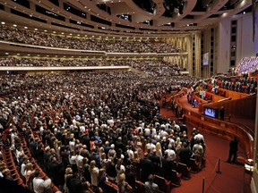 People attend the morning session of the two-day Mormon church conference Saturday, Sept. 30, 2017, in Salt Lake City. (AP Photo/Rick Bowmer)