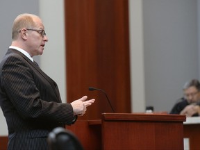 Attorney Edwin Wall speaks before the state Supreme Court, Tuesday Sept. 12, 2017, in Salt Lake City, for a married Utah gay couple over a law that prevents married gay men from having biological children through surrogacy. A gay couple denied the chance to have a baby using a surrogate challenged a Utah law's reference to heterosexual parents, which illustrates the legal complications LGBT couples can face when starting families amid a national patchwork of surrogacy laws. (Al Hartmann/The Salt Lake Tribune, via AP, Pool)