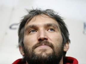 Washington Capitals captain and left wing Alex Ovechkin, from Russia, pauses while speaking during a media availability at the team's NHL hockey practice facility, Friday, Sept. 15, 2017 in Arlington, Va. (AP Photo/Alex Brandon)